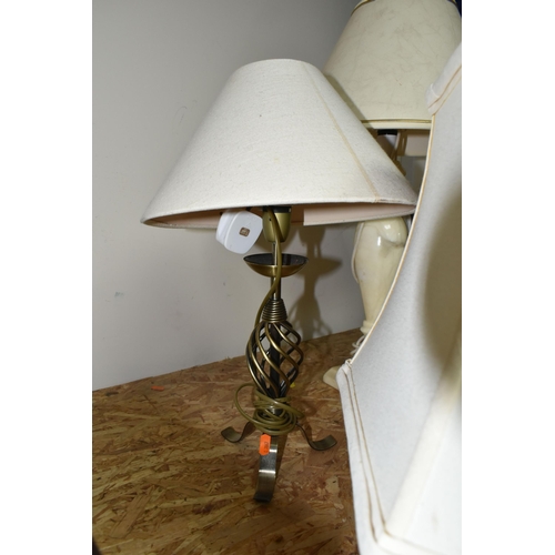 332 - A GROUP OF FOUR TABLE LAMPS AND CARVED WOOD FIGURES, comprising a cream onyx table lamp, a figural '... 