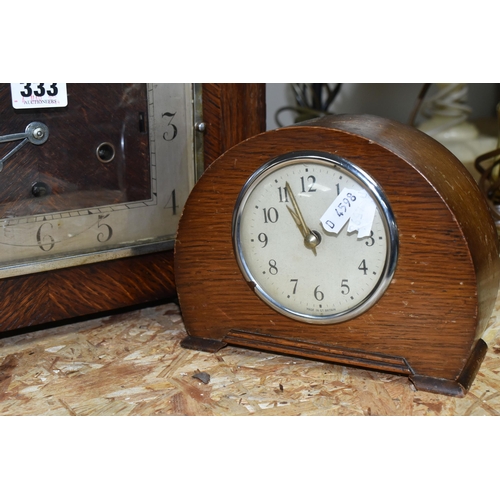 333 - A GROUP OF THREE ART DECO WOODEN CASED MANTEL CLOCKS, comprising a square stepped clock mechanism ma... 