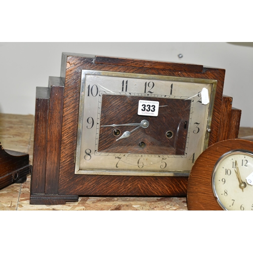 333 - A GROUP OF THREE ART DECO WOODEN CASED MANTEL CLOCKS, comprising a square stepped clock mechanism ma... 