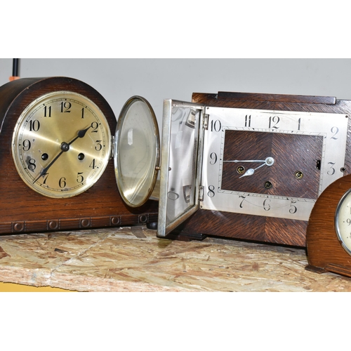 333 - A GROUP OF THREE ART DECO WOODEN CASED MANTEL CLOCKS, comprising a square stepped clock mechanism ma... 