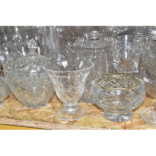 337 - A LARGE QUANTITY OF CUT CRYSTAL AND GLASSWARE, comprising a  Waterford Crystal miniature mantel cloc... 