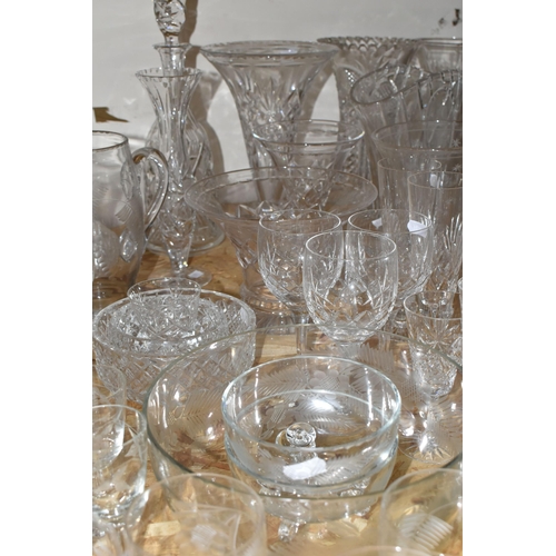 337 - A LARGE QUANTITY OF CUT CRYSTAL AND GLASSWARE, comprising a  Waterford Crystal miniature mantel cloc... 