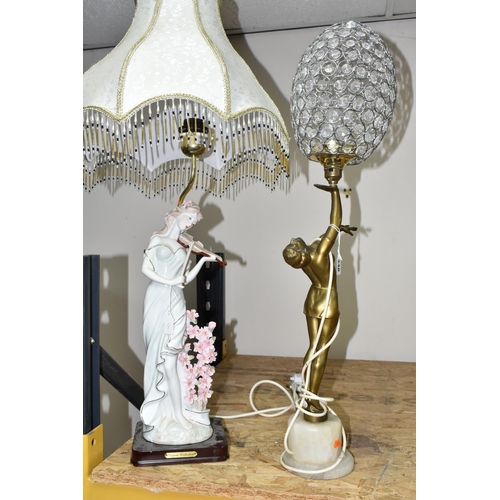 348 - TWO FIGURAL TABLE LAMPS, to include an art deco style lamp, in the form of a gilt female figure stan... 