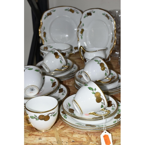 352 - A TWENTY EIGHT PIECE ROYAL ALBERT CROWN CHINA 1920s TEA SET, pattern no 4795, with gilt fruit on pri... 