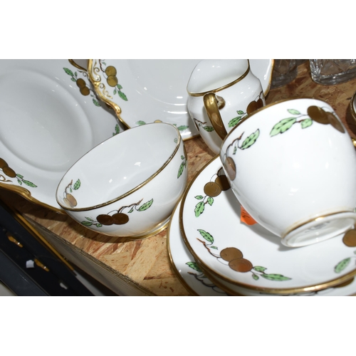 352 - A TWENTY EIGHT PIECE ROYAL ALBERT CROWN CHINA 1920s TEA SET, pattern no 4795, with gilt fruit on pri... 