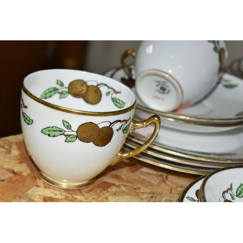 352 - A TWENTY EIGHT PIECE ROYAL ALBERT CROWN CHINA 1920s TEA SET, pattern no 4795, with gilt fruit on pri... 