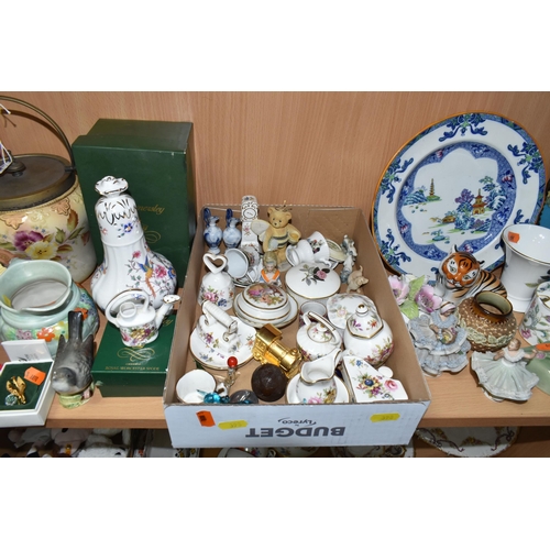 398 - A COLLECTION OF CERAMICS, ORNAMENTS, SWAROVSKI CRYSTAL AND METALWARE, to include a small Doulton Lam... 