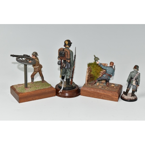 405 - FOUR DIECAST FIGURES OF SOLDIERS, in British and German First World War uniforms, with weapons etc.,... 