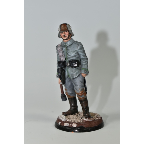 405 - FOUR DIECAST FIGURES OF SOLDIERS, in British and German First World War uniforms, with weapons etc.,... 