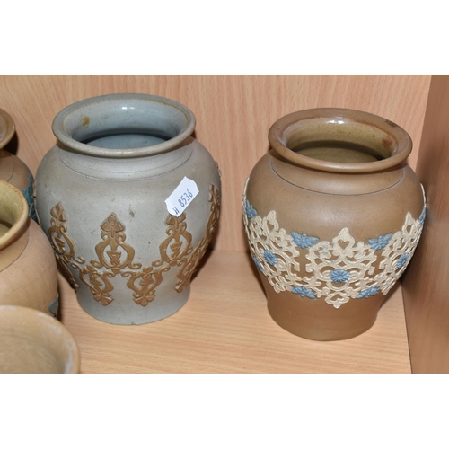 408 - A GROUP OF DOULTON LAMBETH SILICON WARE POTS, eight pieces with applied floral, foliate and patterne... 