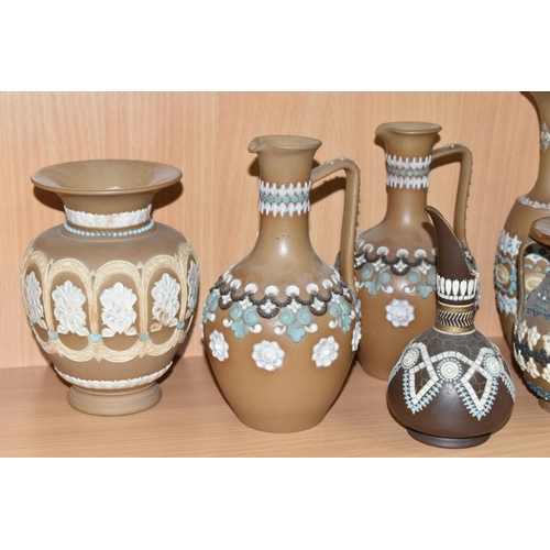 425 - A GROUP OF DOULTON LAMBETH SILICON WARE VASES AND JUGS, twelve pieces with applied floral, foliate a... 