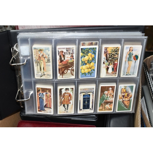 457 - SIX ALBUMS OF CIGARETTE & TRADE CARDS containing approximately seventy-six sets and part-sets from C... 