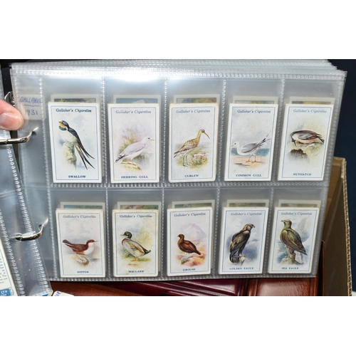 458 - SIX ALBUMS OF CIGARETTE CARDS containing approximately fifty-five sets from Gallaher, Ogden's, John ... 