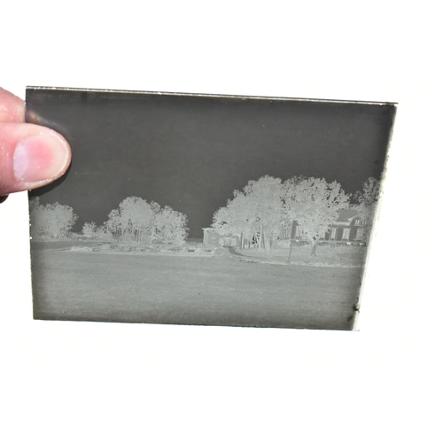 459 - TWO WOODEN BOXES OF GLASS NEGATIVES, subjects include topographical, buildings, scenic, people and p... 