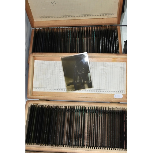 468 - TWO BOXES OF GLASS PHOTOGRAPHIC NEGATIVE SLIDES (approx. 10.7cm x 8.2cm) containing 90 slides featur... 