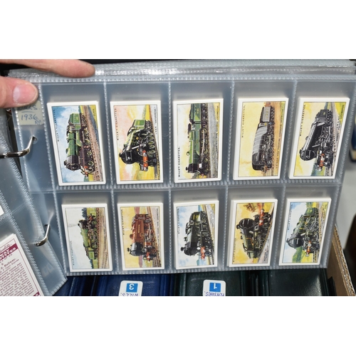 469 - SIX ALBUMS OF CIGARETTE CARDS containing approximately eighty-two sets and part-sets from Wills, Joh... 