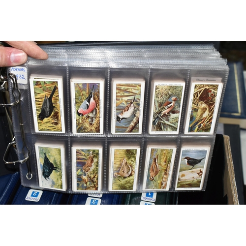 469 - SIX ALBUMS OF CIGARETTE CARDS containing approximately eighty-two sets and part-sets from Wills, Joh... 