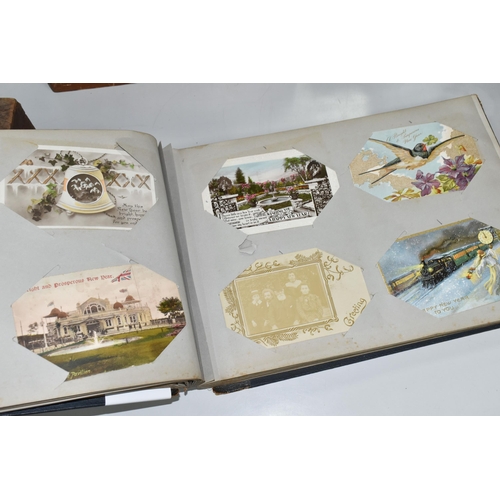 470 - TWO POSTCARD ALBUMS containing approximately 392 early 20th century Postcards subjects include senti... 