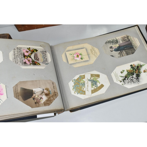 470 - TWO POSTCARD ALBUMS containing approximately 392 early 20th century Postcards subjects include senti... 