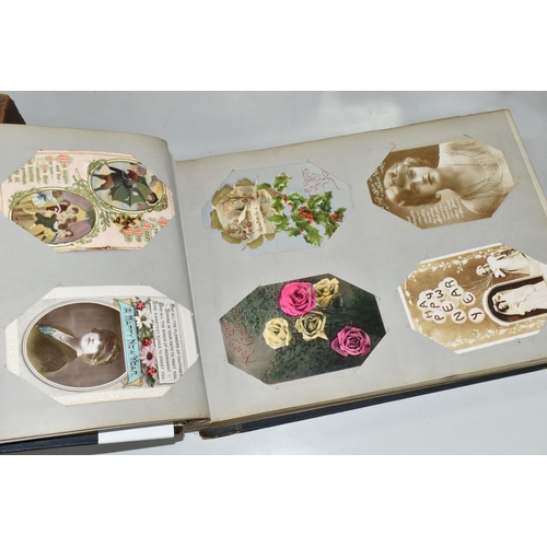 470 - TWO POSTCARD ALBUMS containing approximately 392 early 20th century Postcards subjects include senti... 