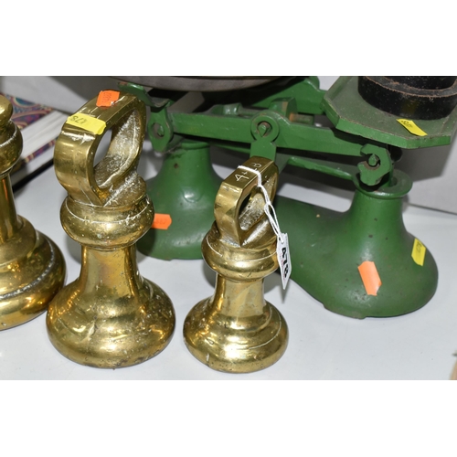 478 - A SET OF CAST BALANCE SCALES AND BRASS WEIGHTS, comprising a green painted set of cast scales with a... 