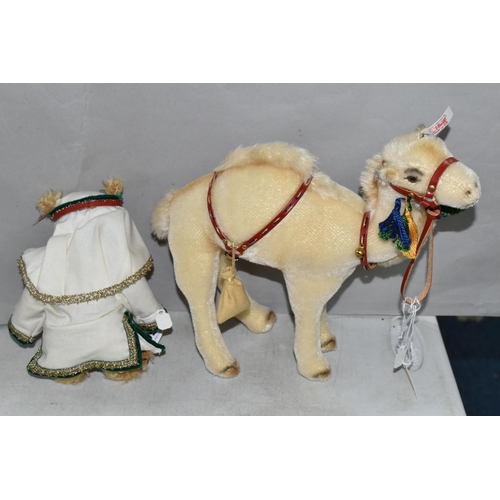 503 - A STEIFF TEDDY WITH DROMEDARY, white tag 037924, comprising mohair teddy bear and camel, limited edi... 