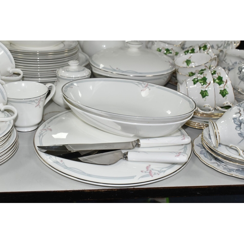 516 - A COLLECTION OF TEA WARE, to include a twenty two piece Royal Albert 'Silver Maple' tea set: a cake ... 