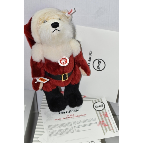 575 - A BOXED LIMITED EDITION STEIFF 'SANTA CHRISTMAS' MUSICAL TEDDY BEAR, plays 'Silent Night', jointed w... 