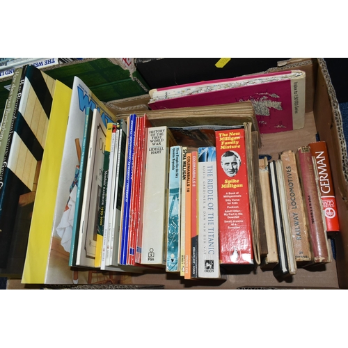 592 - FOUR BOXES OF BOOKS & MAGAZINES containing a large quantity of miscellaneous titles in hardback and ... 