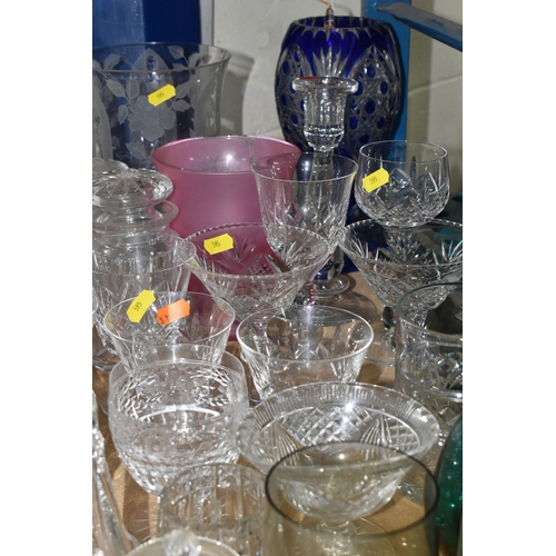 595 - A SELECTION OF CLEAR AND COLOURED GLASSWARES, to include a Skruf of Sweden green decanter with six g... 