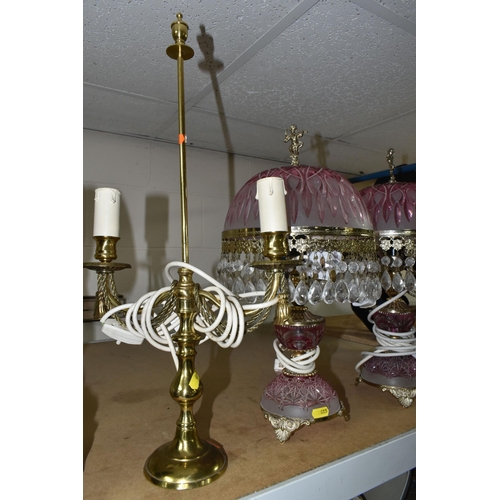 615 - A GROUP OF TABLE LAMPS, comprising a pair of gilt metal lamp bases with two bulb fittings on each, h... 