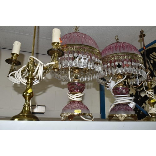 615 - A GROUP OF TABLE LAMPS, comprising a pair of gilt metal lamp bases with two bulb fittings on each, h... 