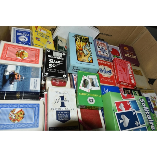 620 - THREE BOXES OF EPHEMERA comprising a large number of playing cards, sports books, rugby league, rugb... 