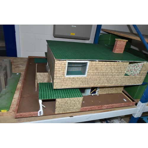 659 - A LARGE WOODEN DOLLS HOUSE IN THE MODERNIST STYLE, two storey building with flat roof, kit or scratc... 