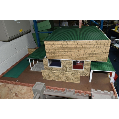 659 - A LARGE WOODEN DOLLS HOUSE IN THE MODERNIST STYLE, two storey building with flat roof, kit or scratc... 