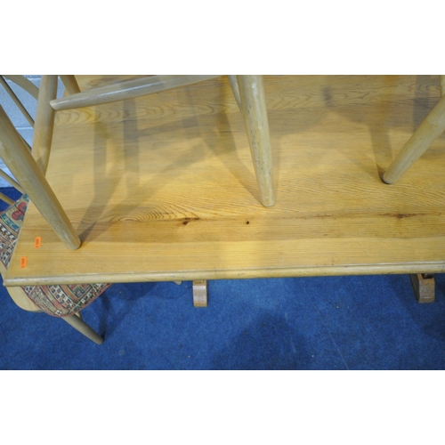 1205 - A PINE RECTANGULAR TRESTLE DINING TABLE, length 152cm x depth 77cm x height 77cm, along with a set o... 