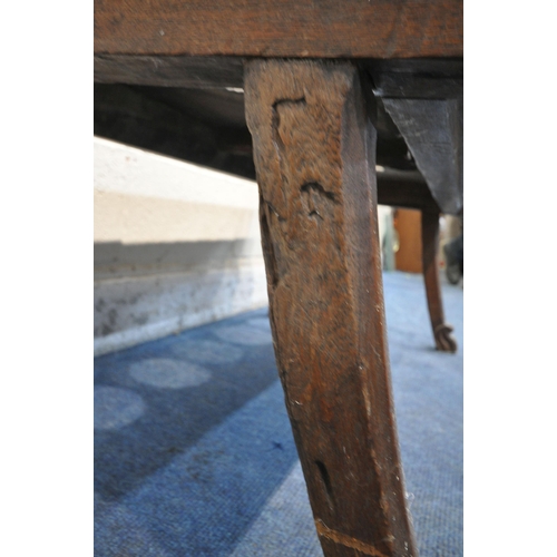 1215 - A TRIBAL TWO SEATER TOILET BENCH OF RECTANGULAR FORM, one side with a carved horse's head to each en... 