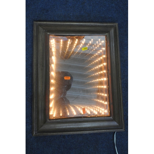 1219 - A VARIETY OF MIRRORS, to include an oval gilt resin bevelled edge wall mirror, 44cm x 88cm, a small ... 