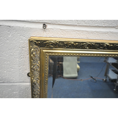 1220 - A RECTANGULAR GILT FRAMED BEVELLED EDGE WALL MIRROR, 99cm x 129cm (condition report: overall good co... 