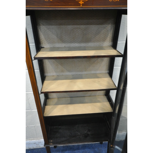 1221 - AN EDWARDIAN MAHOGANY AND INLAID CHINA CABINET, the single astragal glazed door enclosing two shelve... 