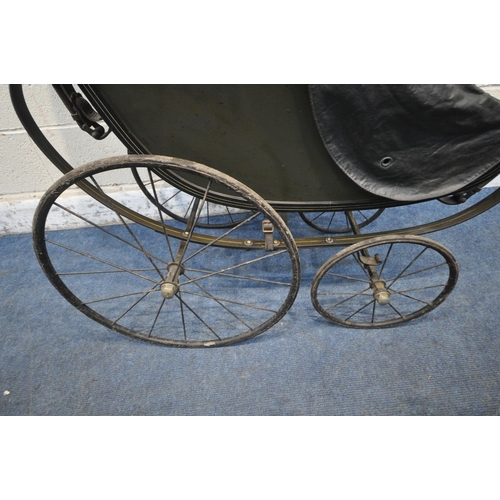 1222 - A LATE 19TH/EARLY 20TH CENTURY FORWARD FACING CHAIR PRAM, with folding canopy, buttoned back and sea... 