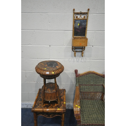 1225 - AN ORIENTAL BAMBOO CIRCULAR LAMP TABLE, with black and foliate patterns, diameter 41cm x height 63cm... 