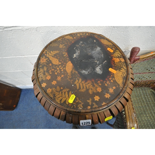 1225 - AN ORIENTAL BAMBOO CIRCULAR LAMP TABLE, with black and foliate patterns, diameter 41cm x height 63cm... 