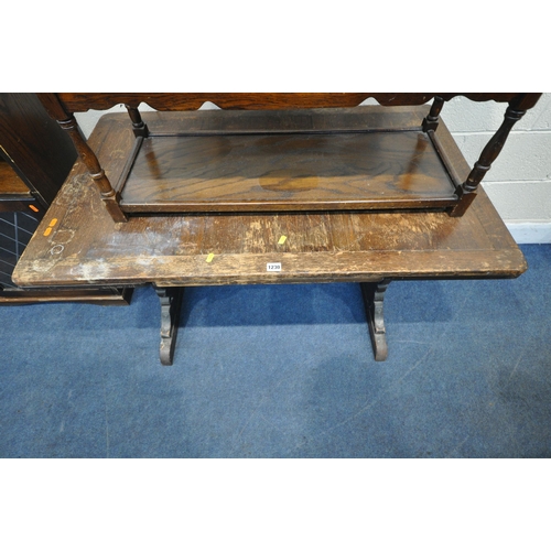 1230 - A 20TH CENTURY OAK EXTENDING DINING TABLE, on trestle legs, length 115cm x depth 72cm x height 74cm,... 