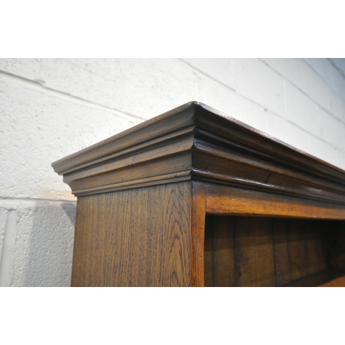 1237 - A GOOD QUALITY REPRODUCTION ELM DRESSER, the top two tier bookcase, atop a base that's fitted with t... 