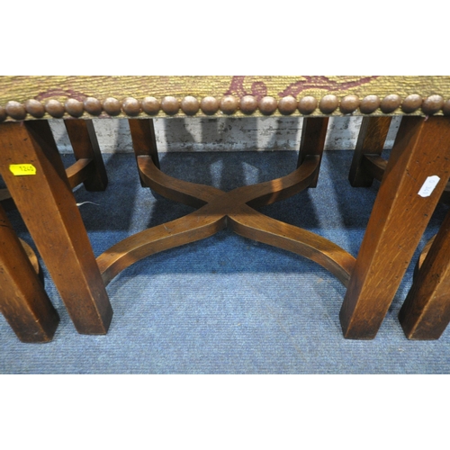 1240 - A SET OF SIX CONTEMPORARY OAK FRAMED CHAIRS, with beige and purple upholstery and shaped cross stret... 