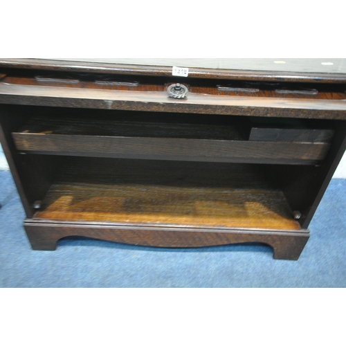 1248 - A JAYCEE OAK TV CABINET, with a rise and fall door, width 90cm x depth 47cm x height 61cm, along wit... 