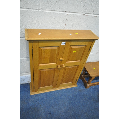 1249 - A REPRODUCTION LIGHT OAK SLIM DOUBLE DOOR CABINET, width 60cm x depth 17cm x height 72cm, a light oa... 