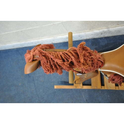 1253 - A PINE FRAMED ROCKING HORSE (condition report: tail loose, surface marks, scuffs, other signs of usa... 