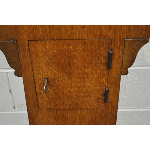 1258 - A 20TH CENTURY OAK CHURCH COLLECTION BOX, with a raised back, small money slot, raised on a tapered ... 